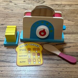Melissa & Doug’s Wooden Toaster Play Set